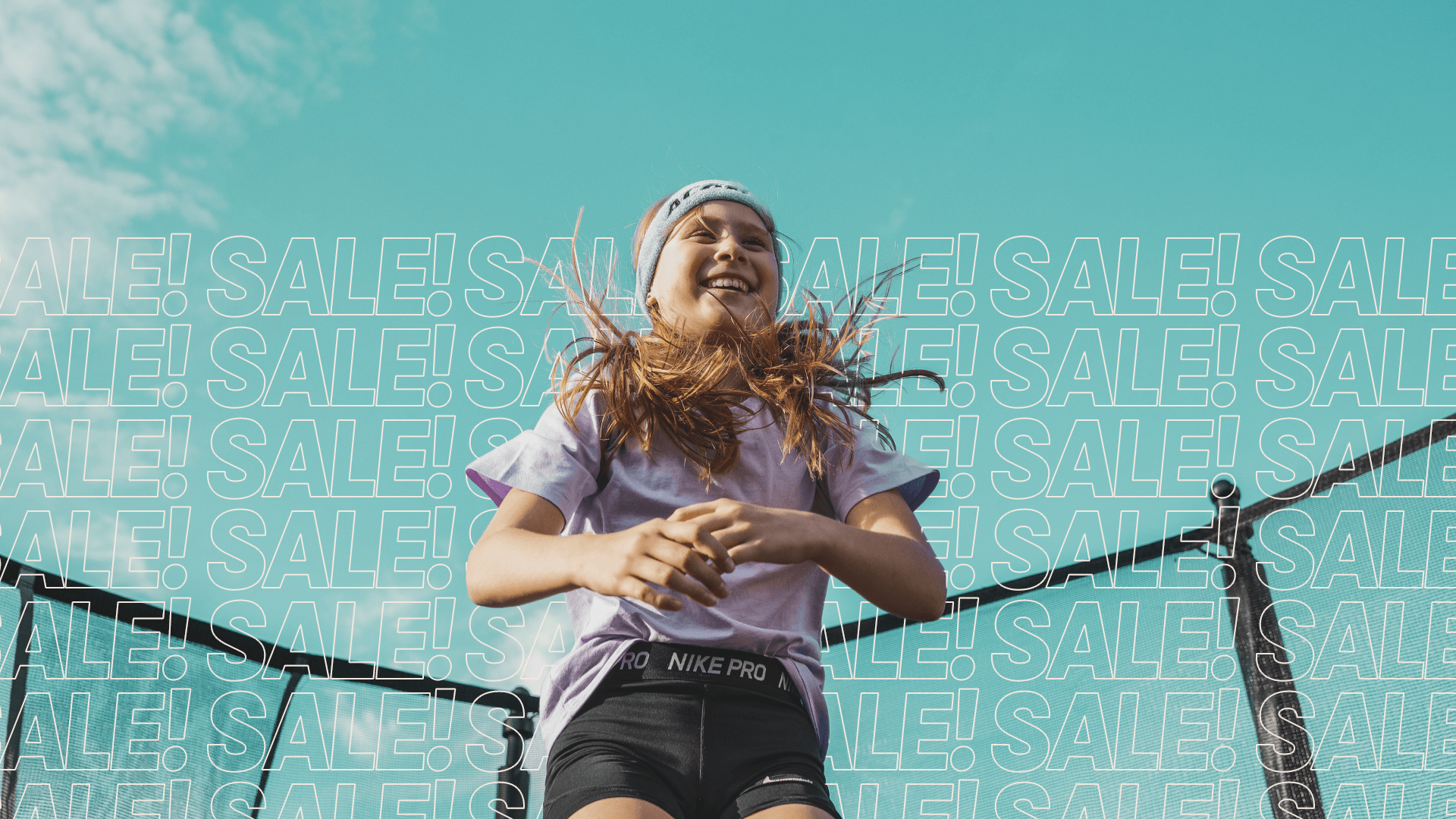 Happy girl jumps on a trampoline, SALE! text running on the backround.