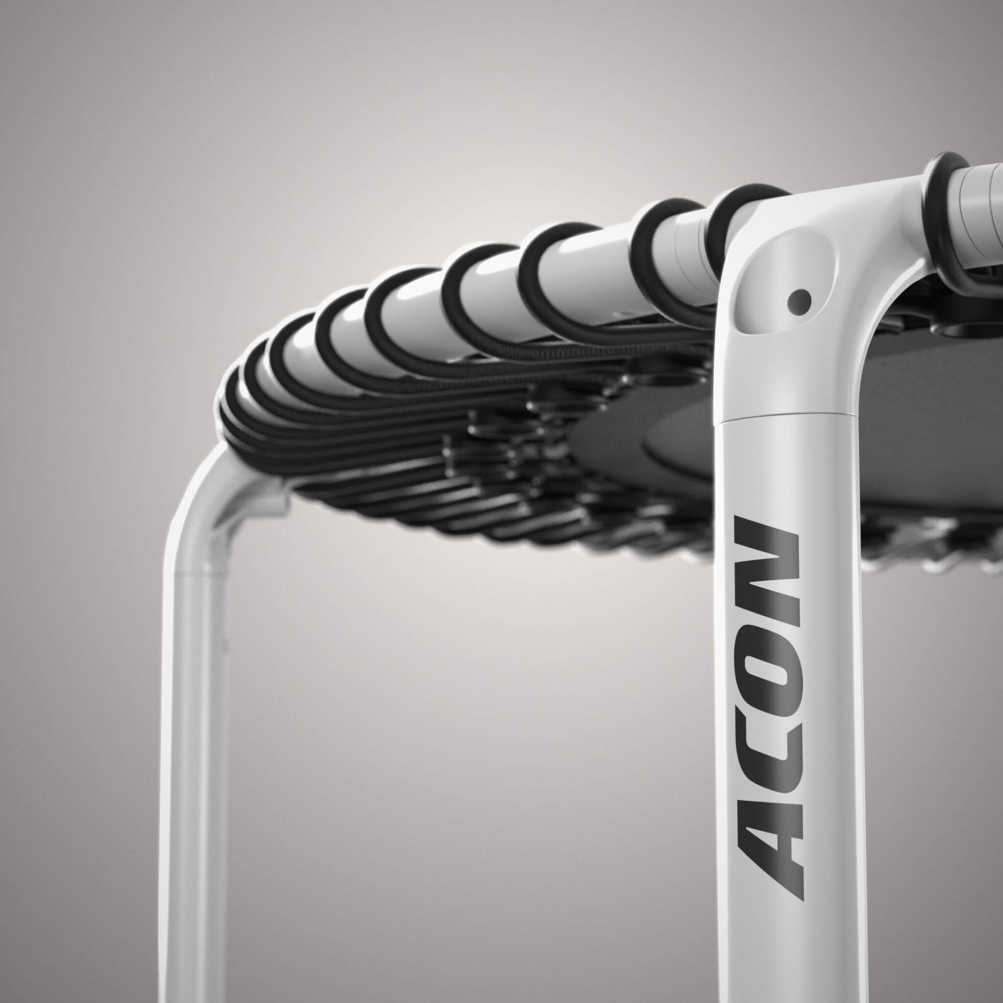 Gros plan sur un trampoline Acon FIT blanc et rond.