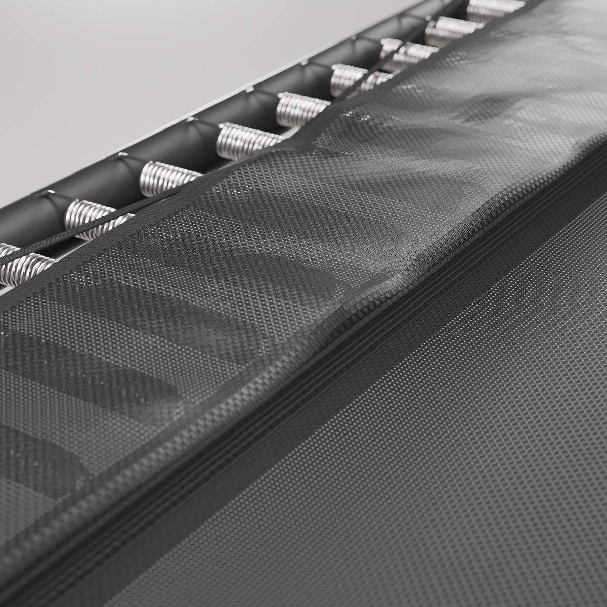 Vue détaillée de la protection recouvrant les ressorts du trampoline ACON HD.