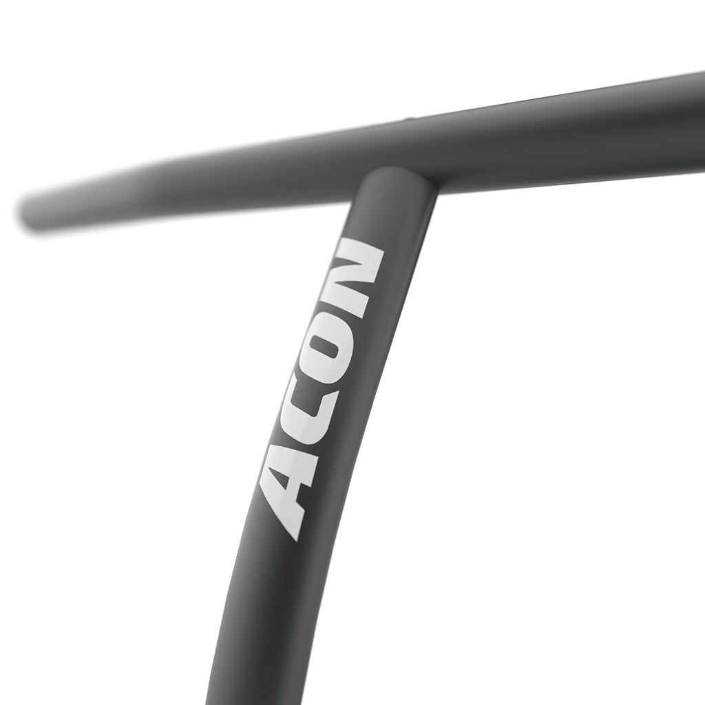 Gros plan du logo ACON sur le guidon noir pour trampoline ACON FIT