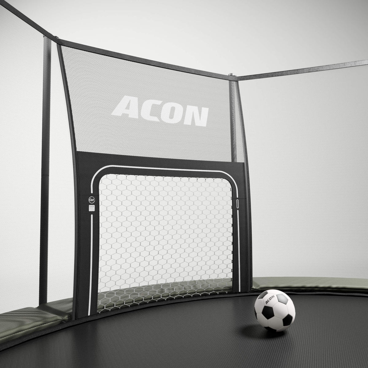 ACON Air but de football ACON Air pour trampolines ronds ACON Air installé sur un trampoline rond ACON Air sur fond gris.