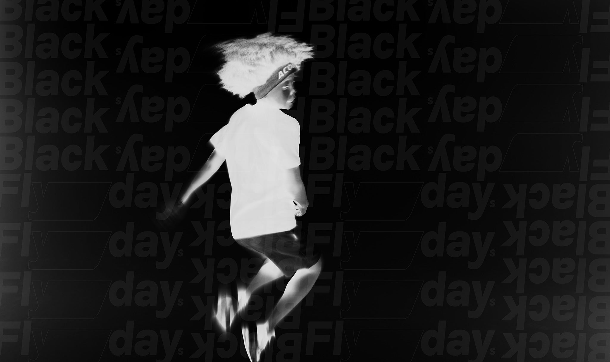 Black Friday trampoline - image de campagne en noir et blanc avec le texte Black Flyday.