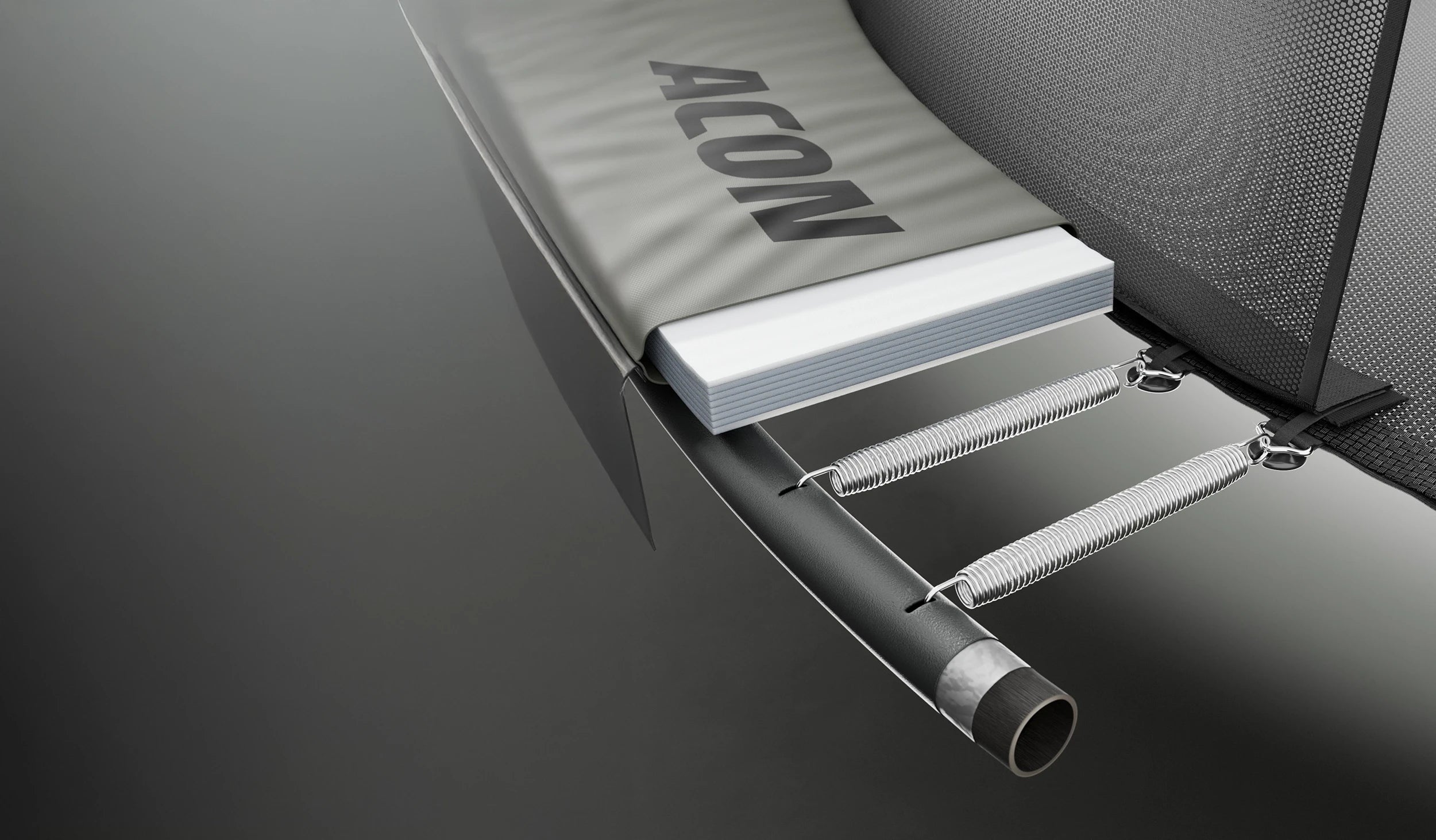 Image en coupe d’un tube de cadre de trampoline Acon Air et d’un rembourrage de sécurité de 3 cm d’épaisseur.